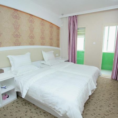 Xinghe Xinfeng Hotel Guangzhou Kamer foto