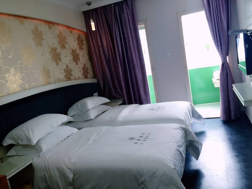 Xinghe Xinfeng Hotel Guangzhou Buitenkant foto